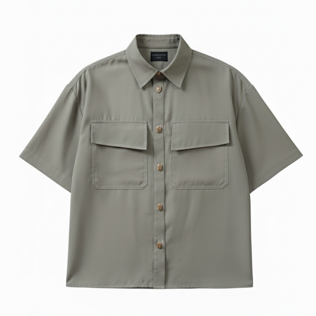 camisa producto 1 Camisa oversize verde olivo de viscosa twill con dos bolsillos con tapeta y botones de bronce, vista frontal