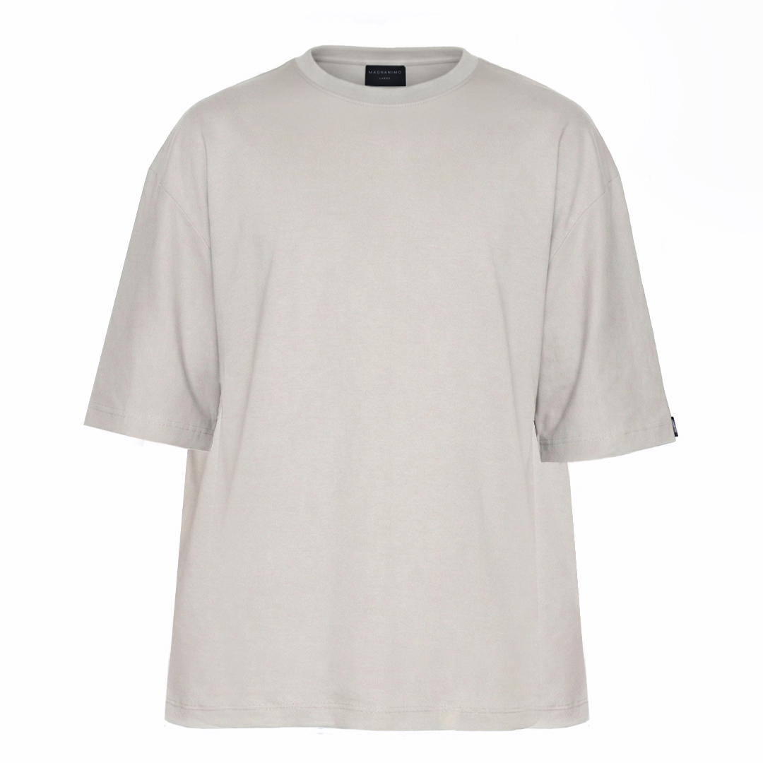 Polera oversize de algodón pima peruano color gris, vista frontal sobre fondo blanco